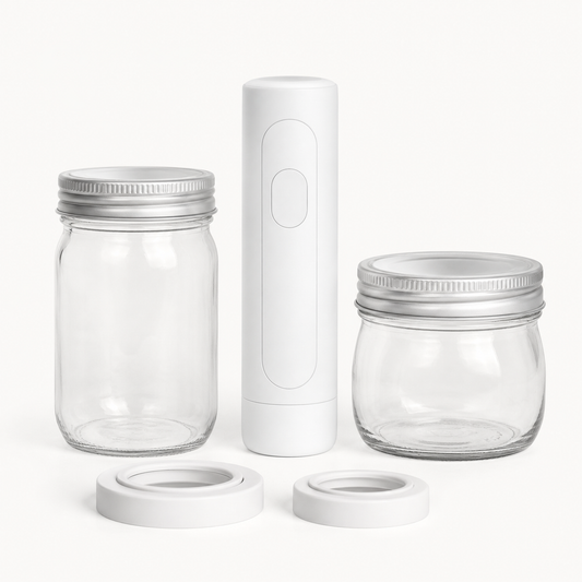 Mason Genie product with mason jars and adapters on white background